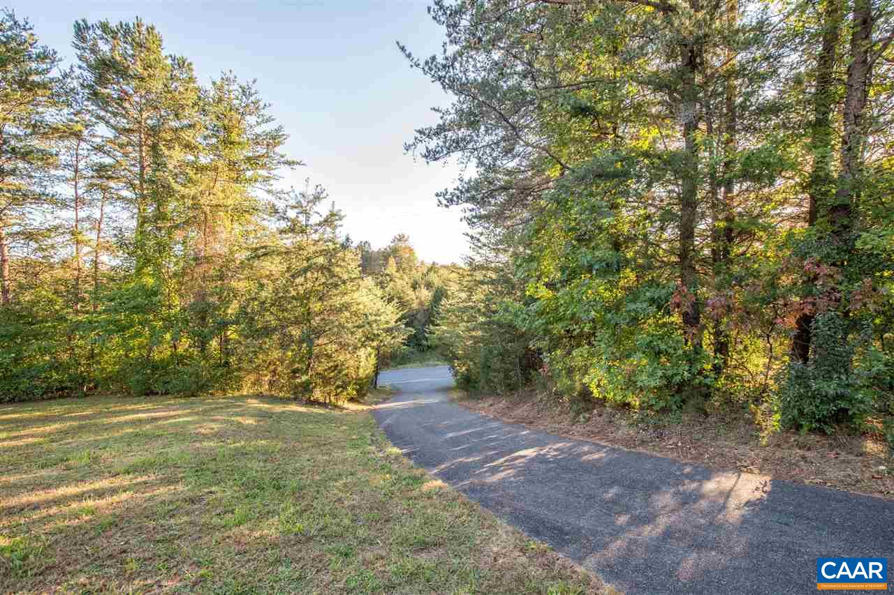 2047 Campbell Road Keswick, VA 22947 - Photo 37 of 39 a view of a yard with large trees