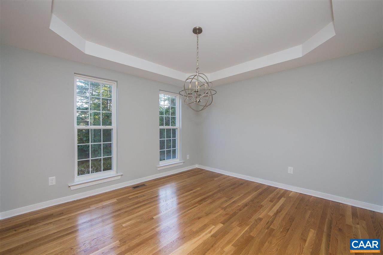 2047 Campbell Road Keswick, VA 22947 - Photo 5 of 39 a view of livingroom with window wooden floor and front door
