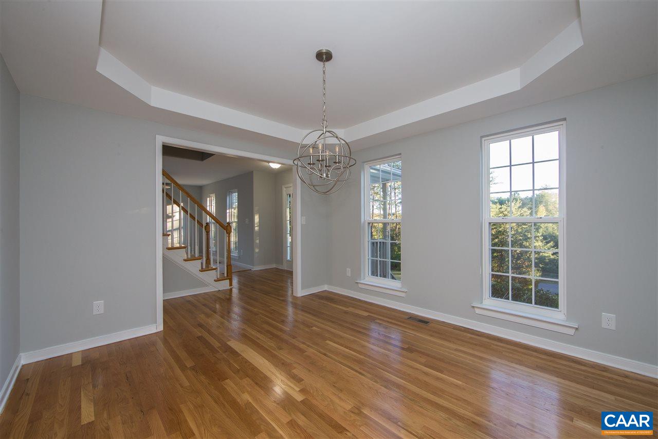 2047 Campbell Road Keswick, VA 22947 - Photo 6 of 39 a view of an empty room with wooden floor and a window