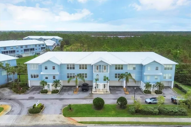 an aerial view of house with outdoor space