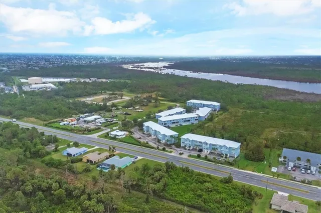 a view of a city with an ocean