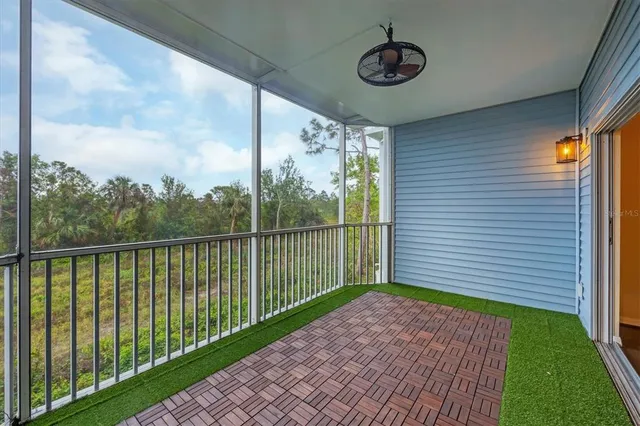 a view of a room with a large window