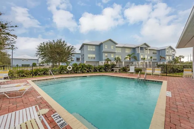 a view of backyard with a garden and plants