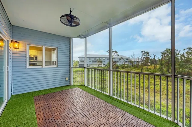 a view of a balcony with an outdoor space