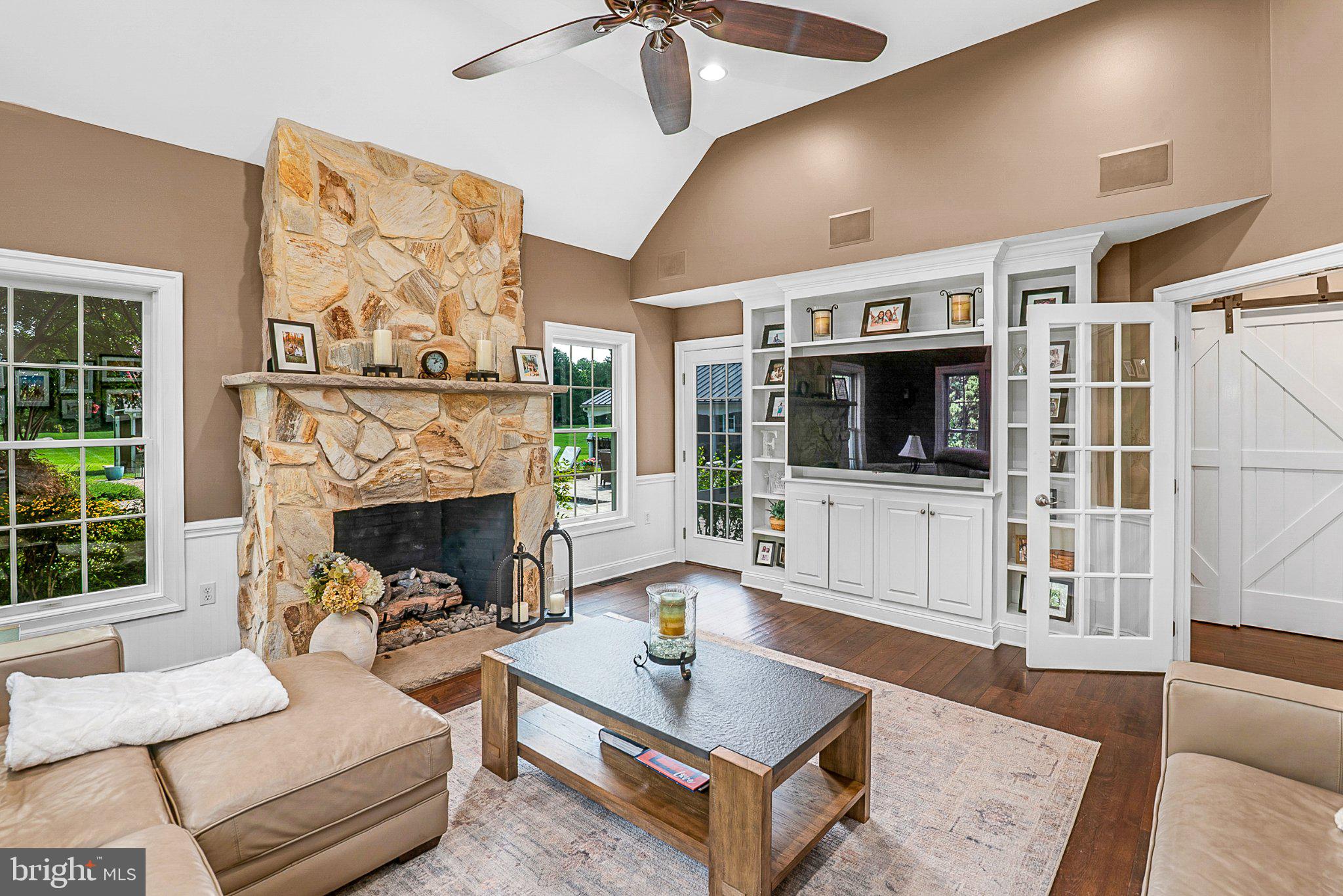 4401 Grove Road Trappe, MD 21673 - Photo 24 of 73 Inviting living space with stone fireplace.
