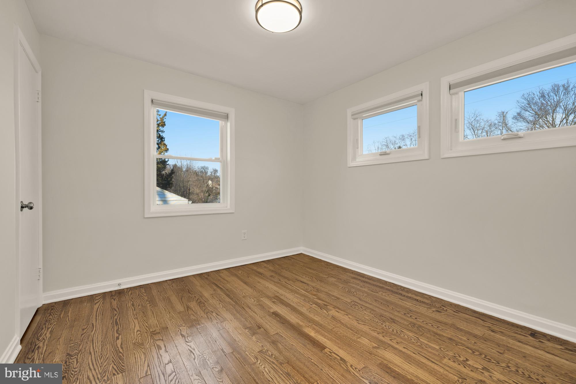 6112 Paulonia Road Alexandria, VA 22310 - Photo 26 of 48 a view of a room with wooden floor and window