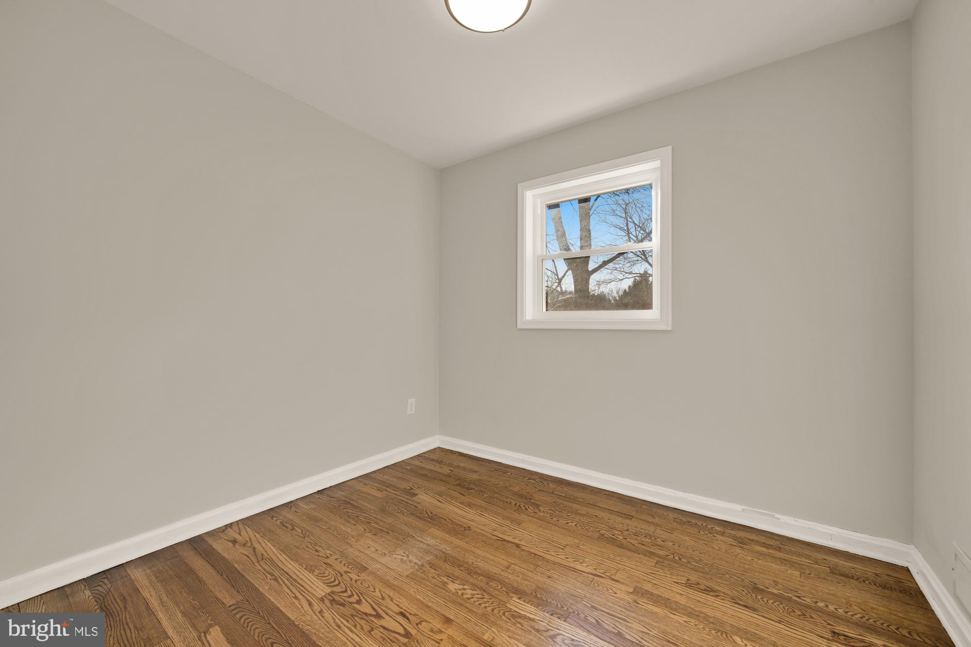 6112 Paulonia Road Alexandria, VA 22310 - Photo 28 of 48 an empty room with a window