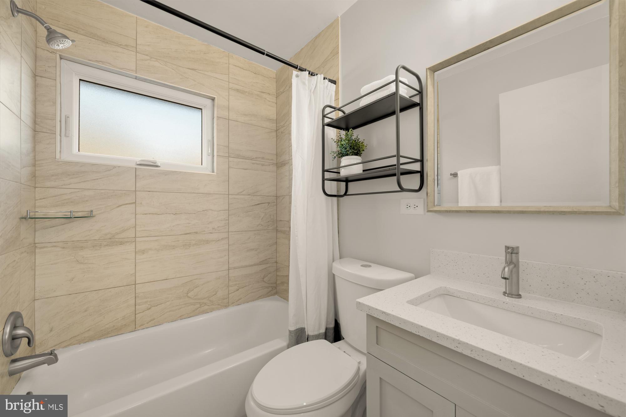 6112 Paulonia Road Alexandria, VA 22310 - Photo 30 of 48 a bathroom with a sink toilet and shower