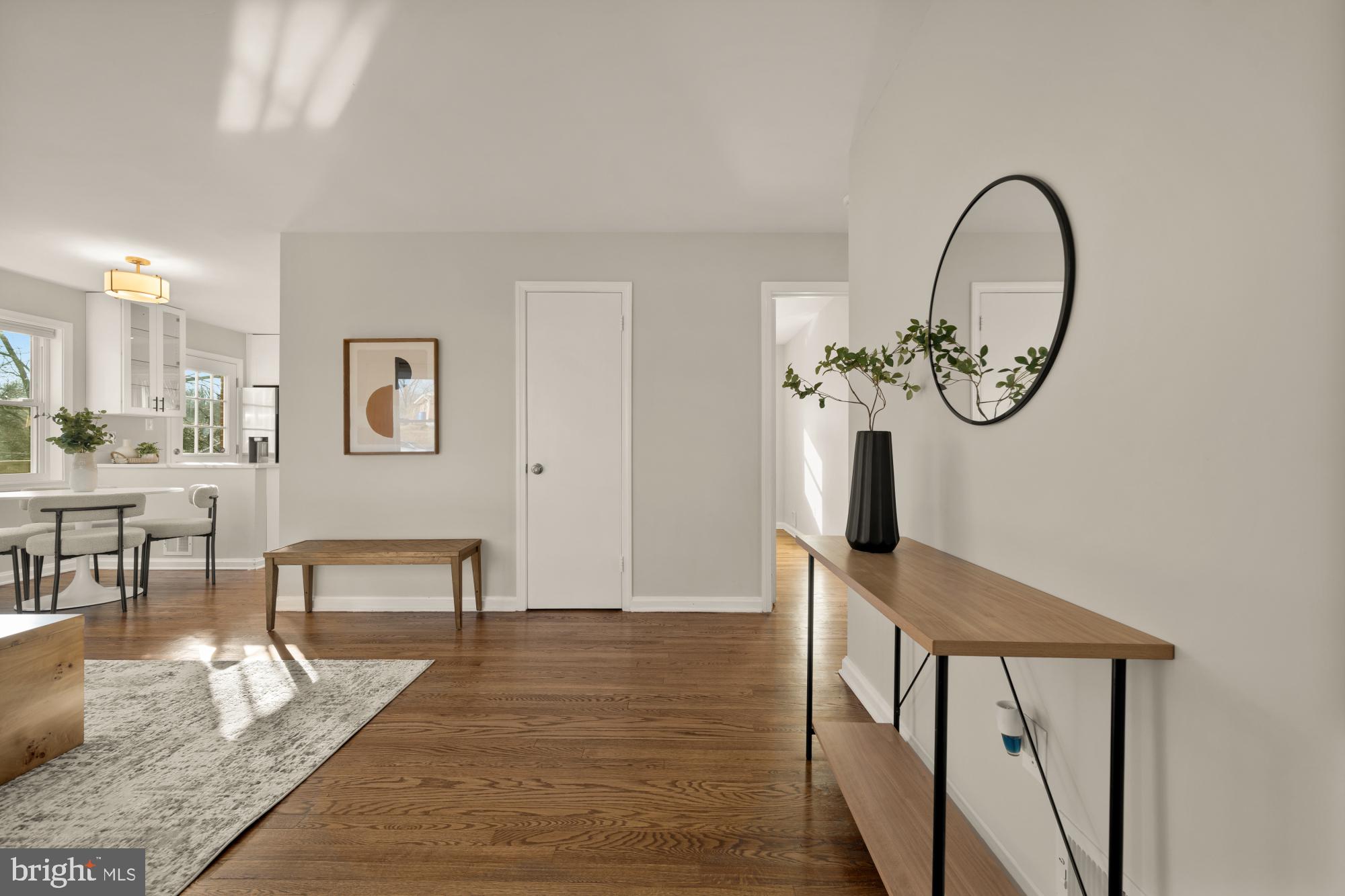 6112 Paulonia Road Alexandria, VA 22310 - Photo 3 of 48 a view of living room filled with furniture and wooden floor