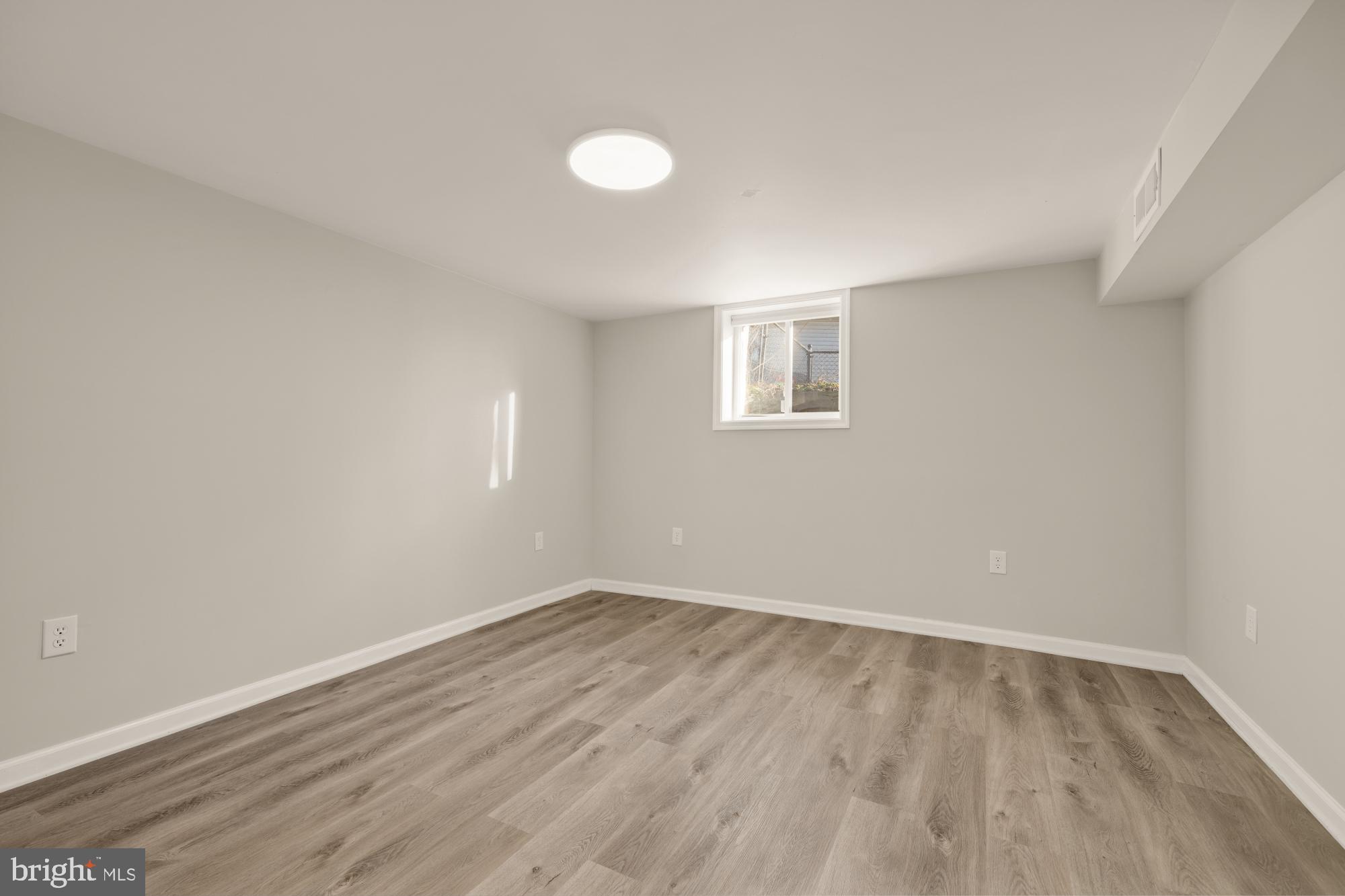 6112 Paulonia Road Alexandria, VA 22310 - Photo 36 of 48 wooden floor in an empty room