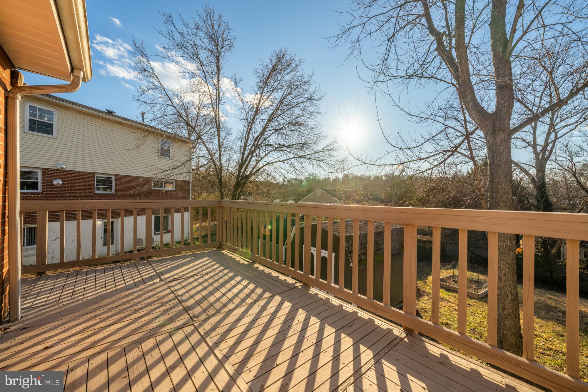 6112 Paulonia Road Alexandria, VA 22310 - Photo 43 of 48 a view of balcony with wooden floor and fence