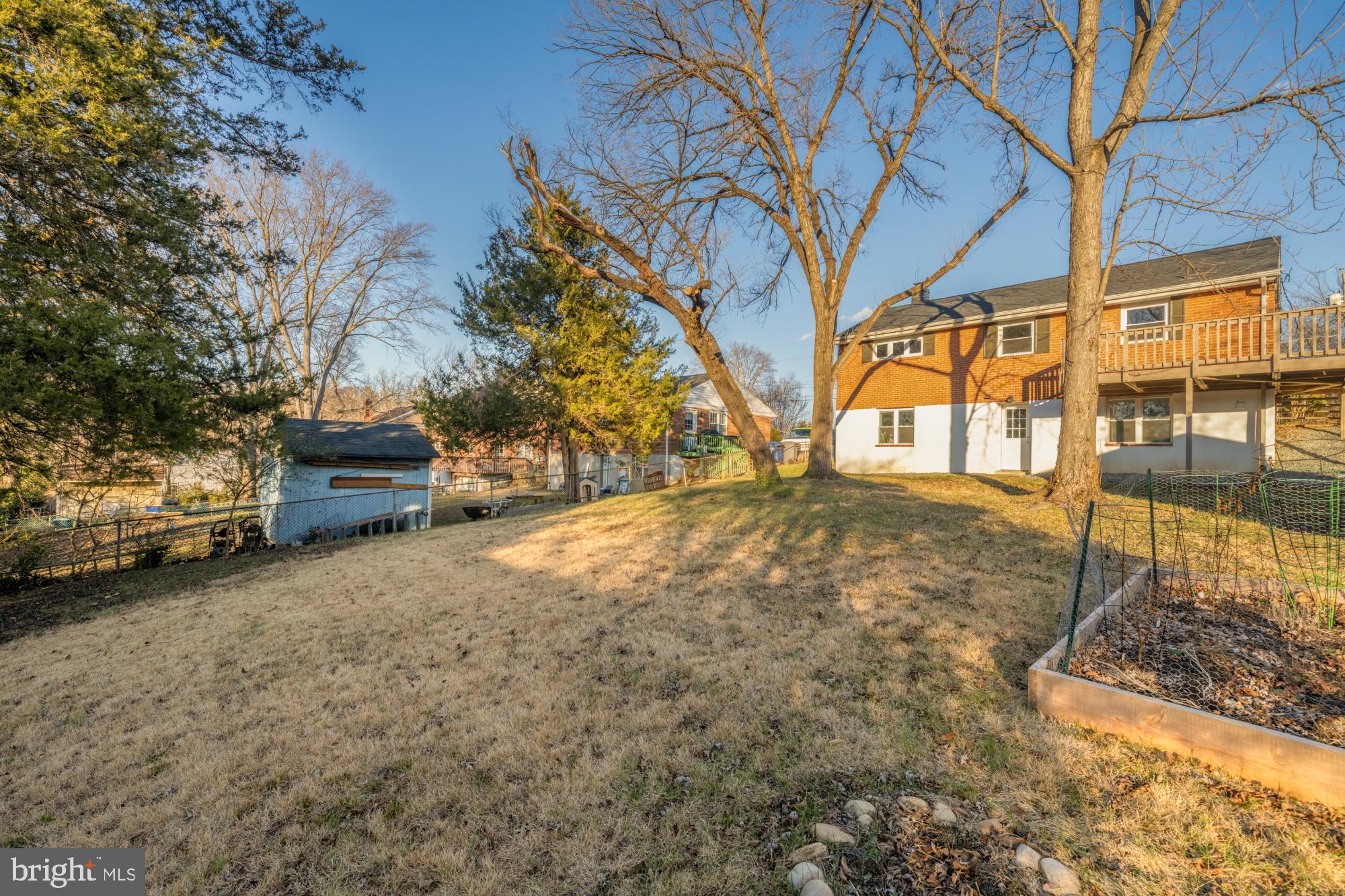 6112 Paulonia Road Alexandria, VA 22310 - Photo 46 of 48 a backyard of a house with lots of green space