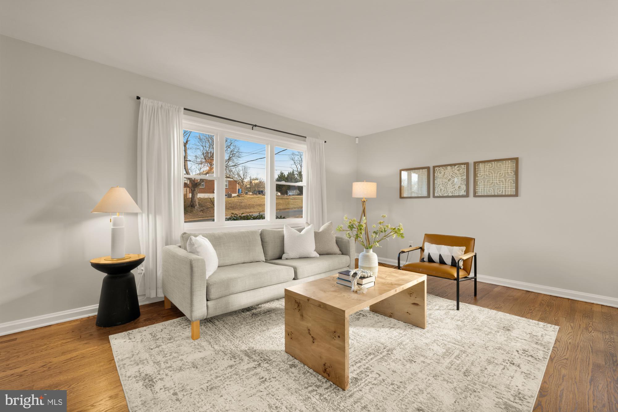 6112 Paulonia Road Alexandria, VA 22310 - Photo 7 of 48 a living room with furniture and a table