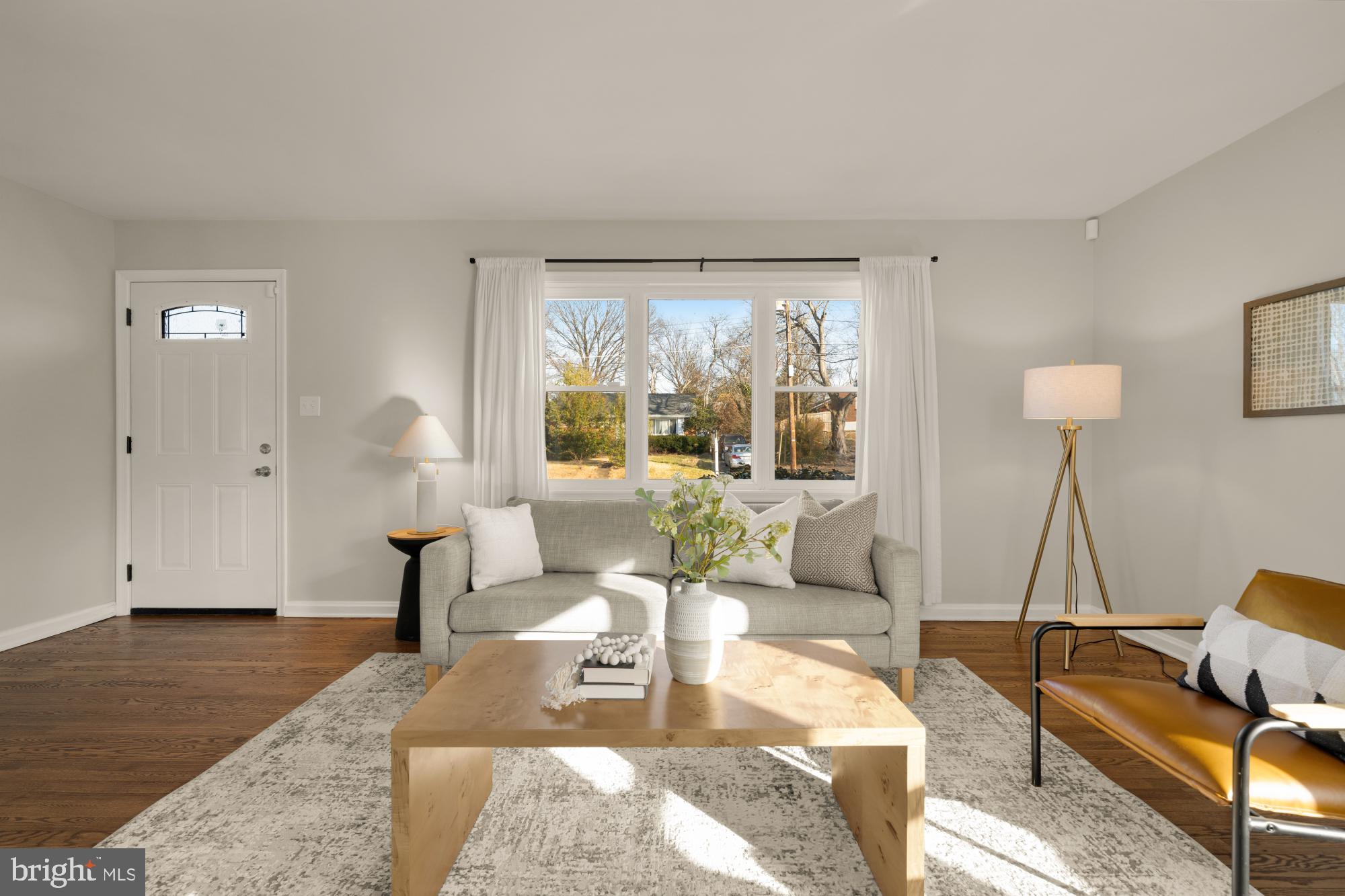 6112 Paulonia Road Alexandria, VA 22310 - Photo 8 of 48 a living room with furniture and a large window