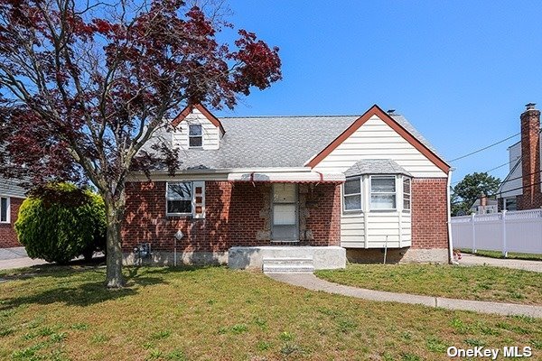 27 Caldwell Road Valley Stream, NY 11580 - Photo 1 of 1 a front view of a house with a yard