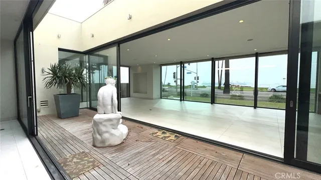 a bathroom with a shower and a sink