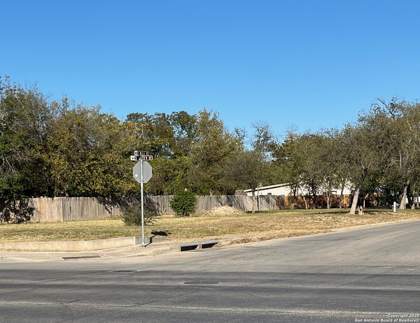 328 South Getty Street Uvalde, TX 78801 - Photo 3 of 12 a view of a fountain is middle in the middle of a road