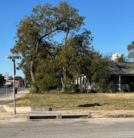 a view of street with houses