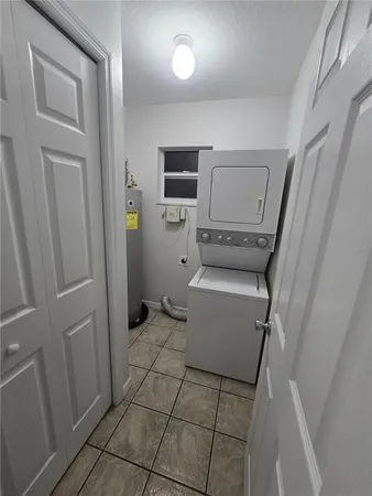 an empty room with wooden floor