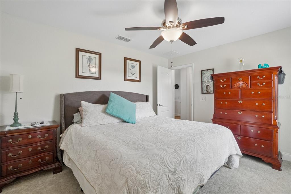 3934 Connersville Road Bartow, FL 33830 - Photo 51 of 81 a bedroom with a bed and a dresser