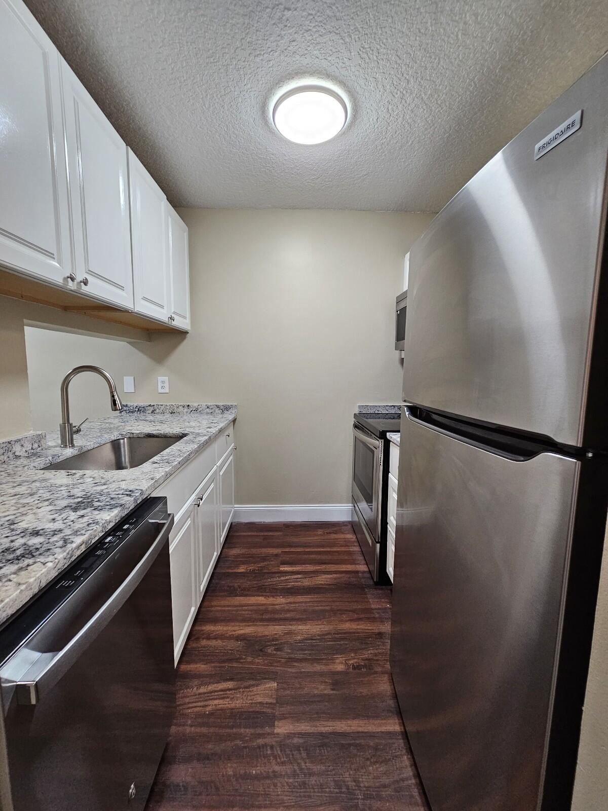 1838 Abbey Road, Unit 102 West Palm Beach, FL 33415 - Photo 5 of 26 20231110_102415_copy_1200x1600