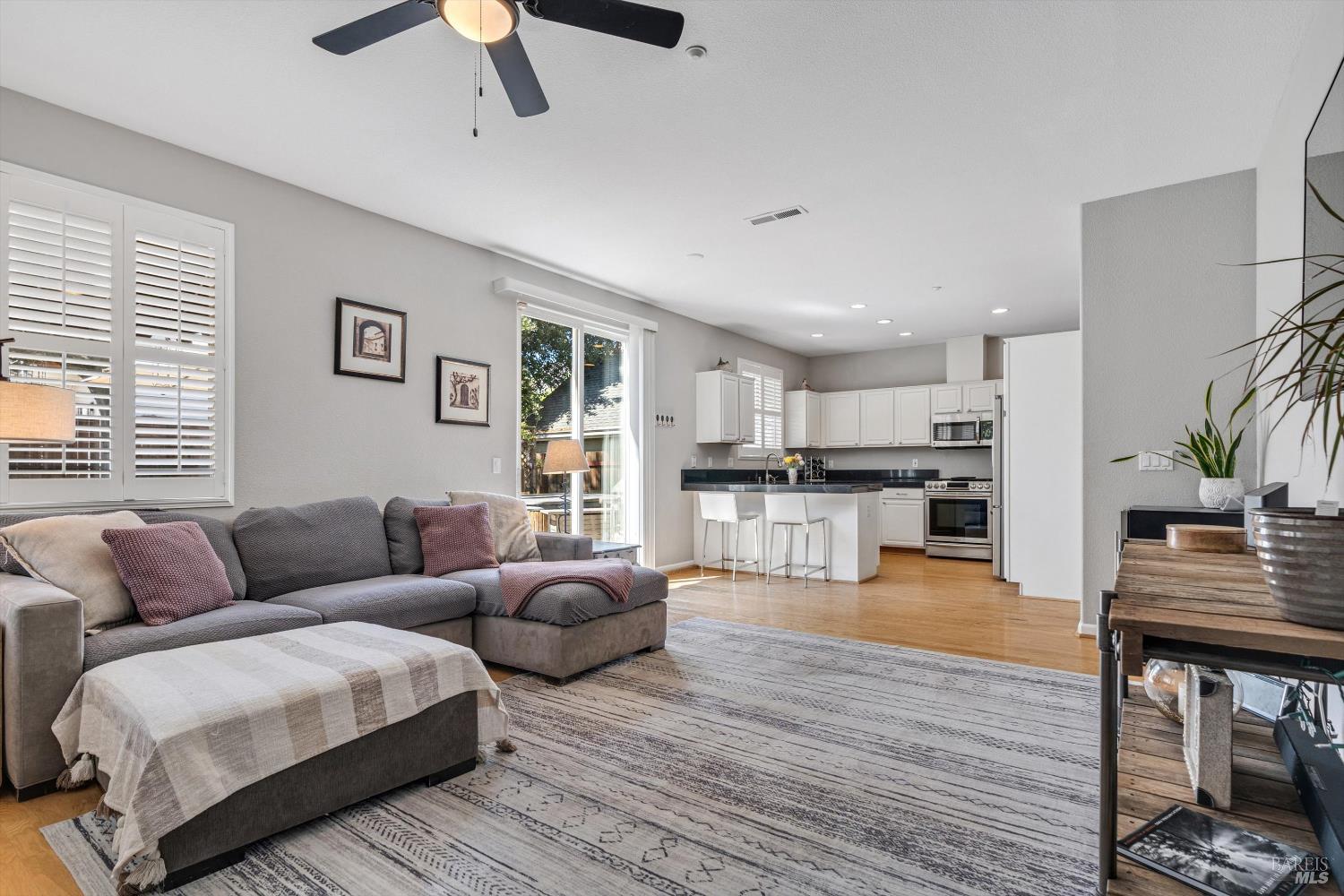 1703 Spur Ridge Lane Healdsburg, CA 95448 - Photo 12 of 28 a living room with furniture and kitchen view
