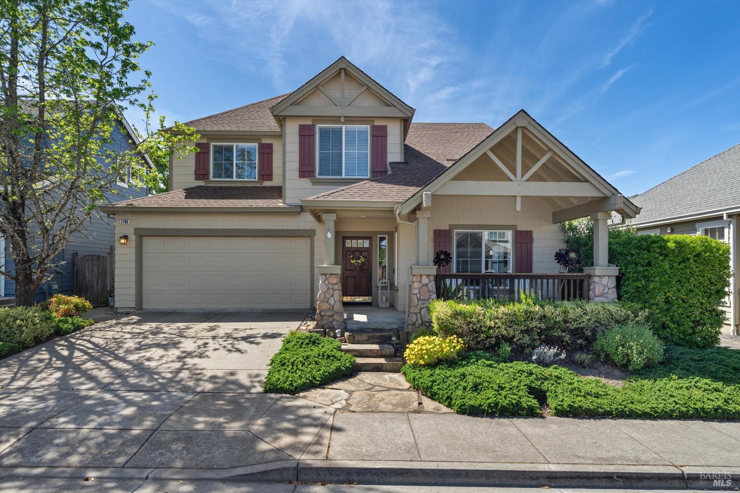 1703 Spur Ridge Lane Healdsburg, CA 95448 - Photo 2 of 28 a front view of a house with garden