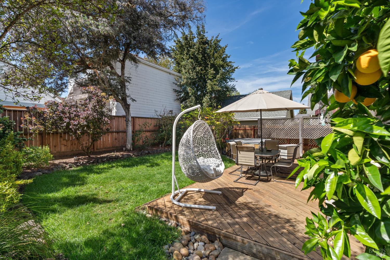 1703 Spur Ridge Lane Healdsburg, CA 95448 - Photo 26 of 28 a view of a garden with a slide and a tree