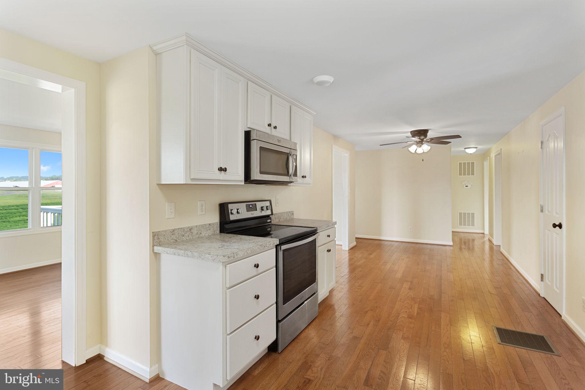 1919 Ridge Road New Market, VA 22844 - Photo 7 of 24 Kitchen with dining area and view to living room.