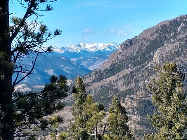 a picture of a room with a floor to ceiling window