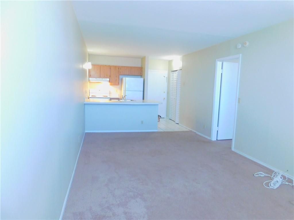 2501 Riverside Drive, Unit 506A Coral Springs, FL 33065 - Photo 5 of 11 an empty room with a window