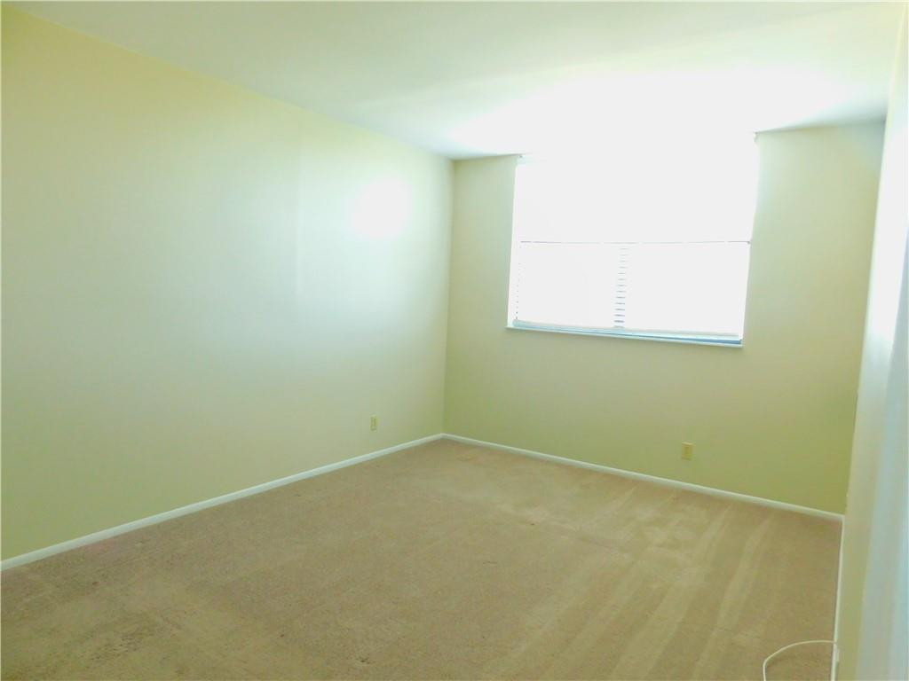 2501 Riverside Drive, Unit 506A Coral Springs, FL 33065 - Photo 7 of 11 an empty room with a window