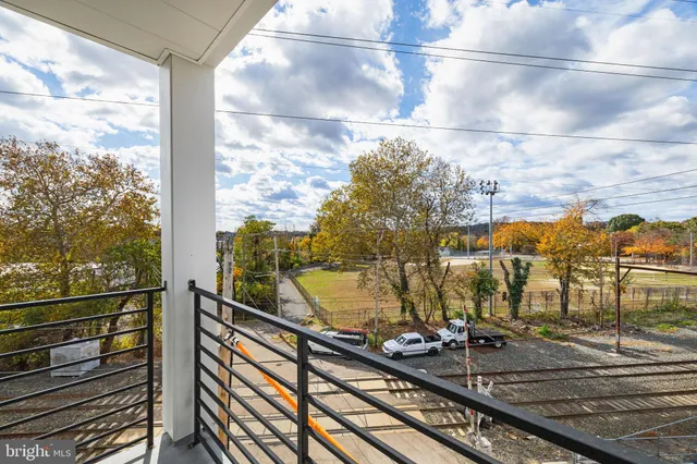a view of a balcony with a ocean view