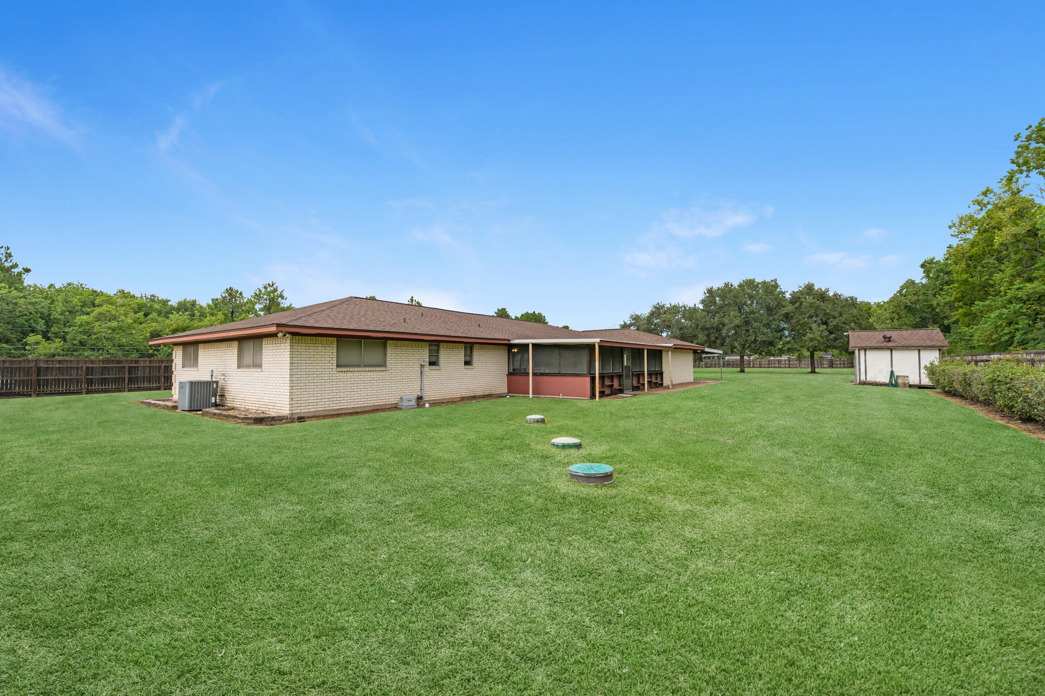 7315 Pine Street Manvel, TX 77578 - Photo 21 of 50 a view of a house with a big yard