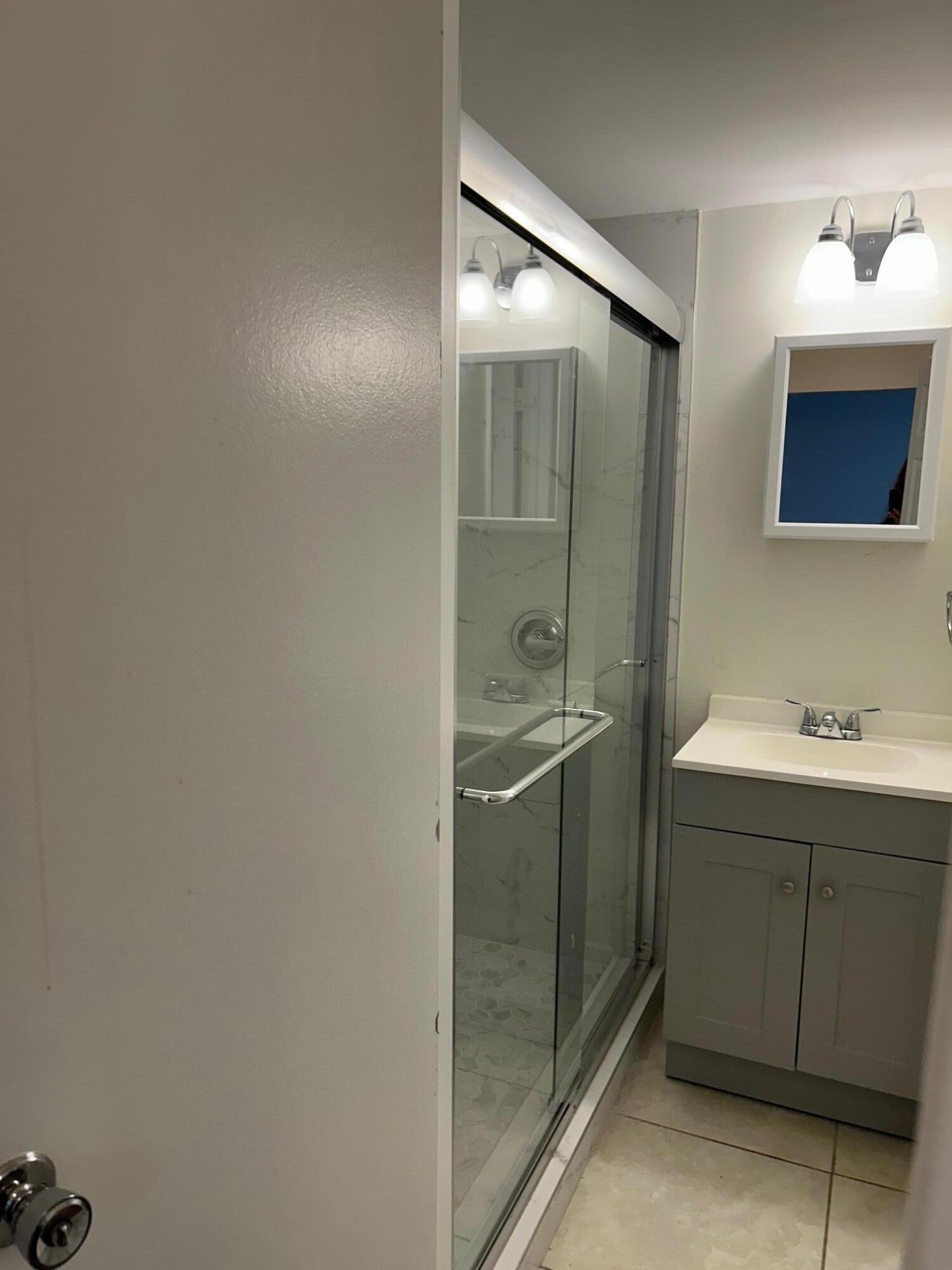 620 Northwest 13th Street, Unit 15 Boca Raton, FL 33486 - Photo 15 of 29 Primary Bath