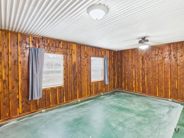 an empty room with windows