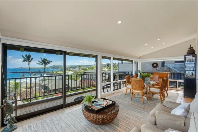 a living room with furniture and a table