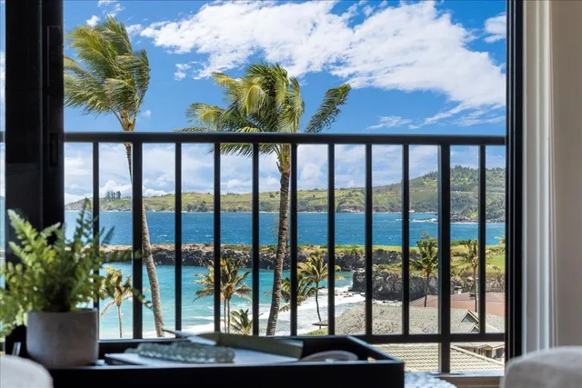 a view of ocean from a balcony