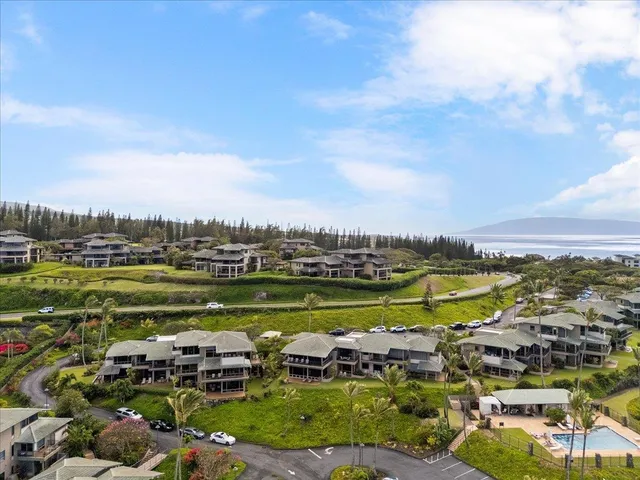 a view of a city with lawn chairs