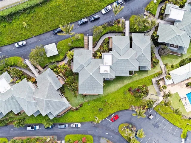 an aerial view of a house with a garden