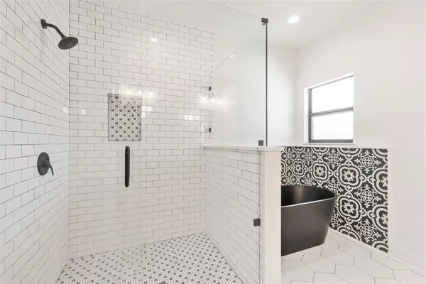 a bathroom with a sink and a shower