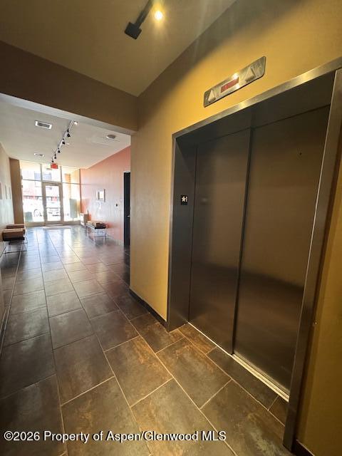 361 Robinson Street, Unit 232 Basalt, CO 81621 - Photo 24 of 26 a view of a gallery with wooden floor