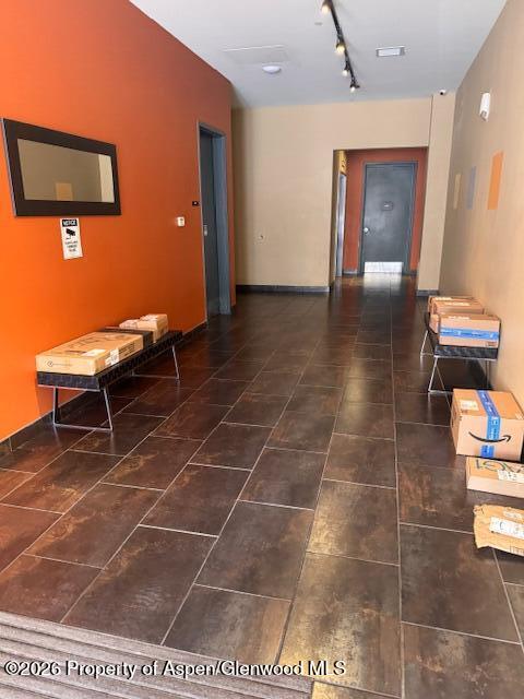 361 Robinson Street, Unit 232 Basalt, CO 81621 - Photo 25 of 26 a room with a table and a potted plant