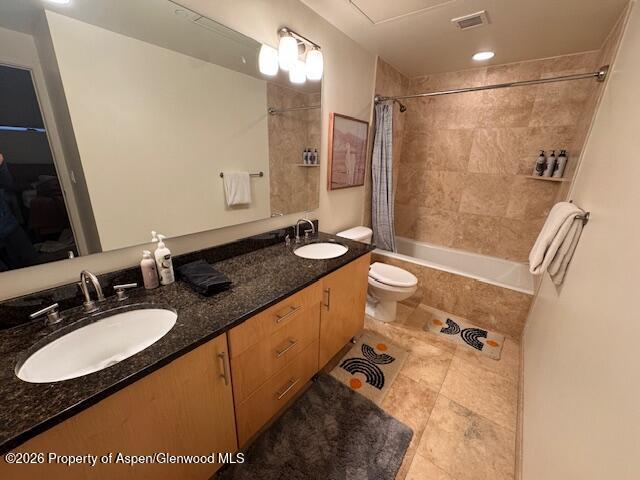 361 Robinson Street, Unit 232 Basalt, CO 81621 - Photo 8 of 26 a bathroom with a granite countertop sink toilet a mirror a bathtub and shower