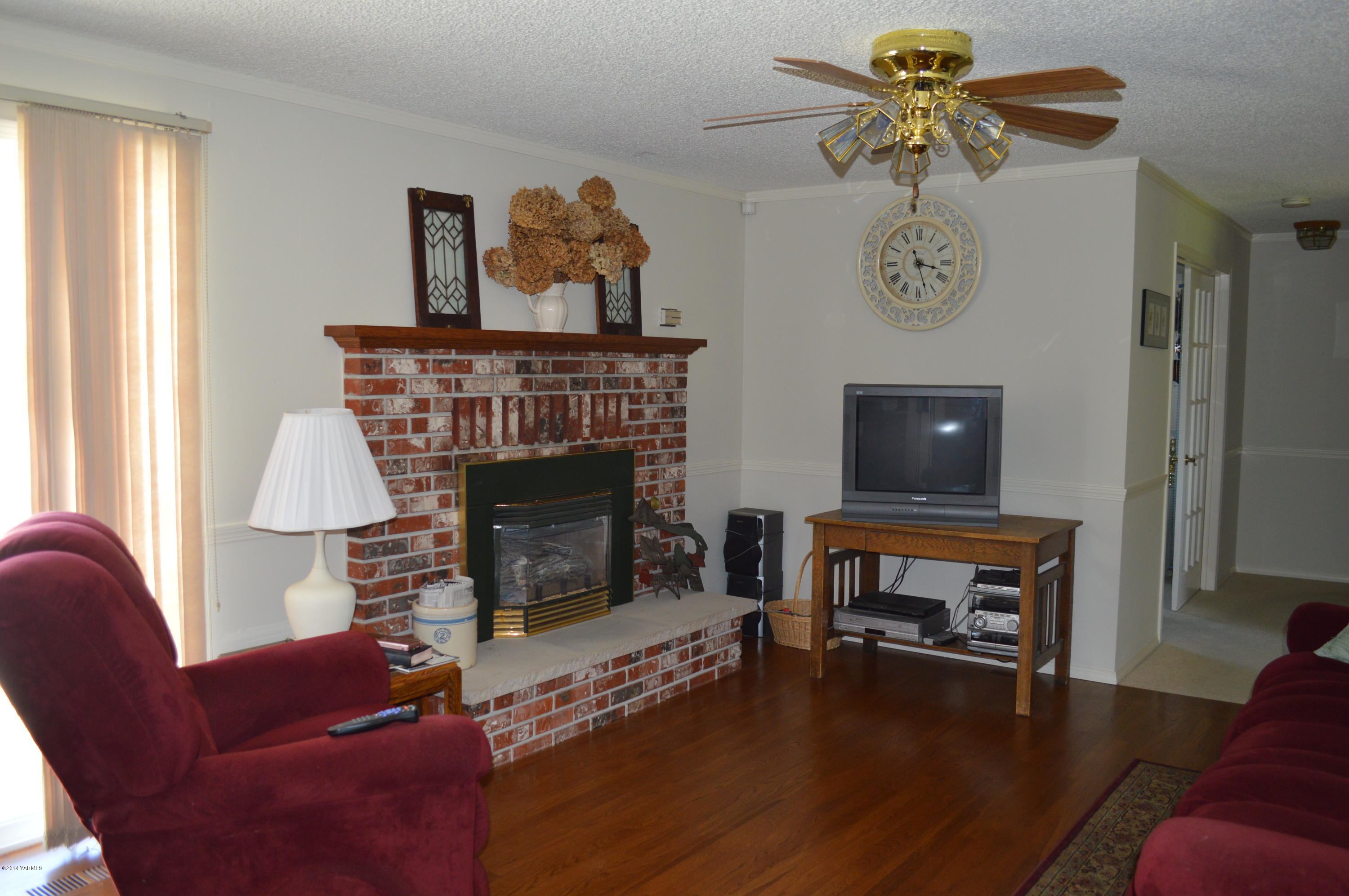 1051 Hubbard Road Yakima, WA 98903 - Photo 11 of 50 a living room with furniture and a fireplace