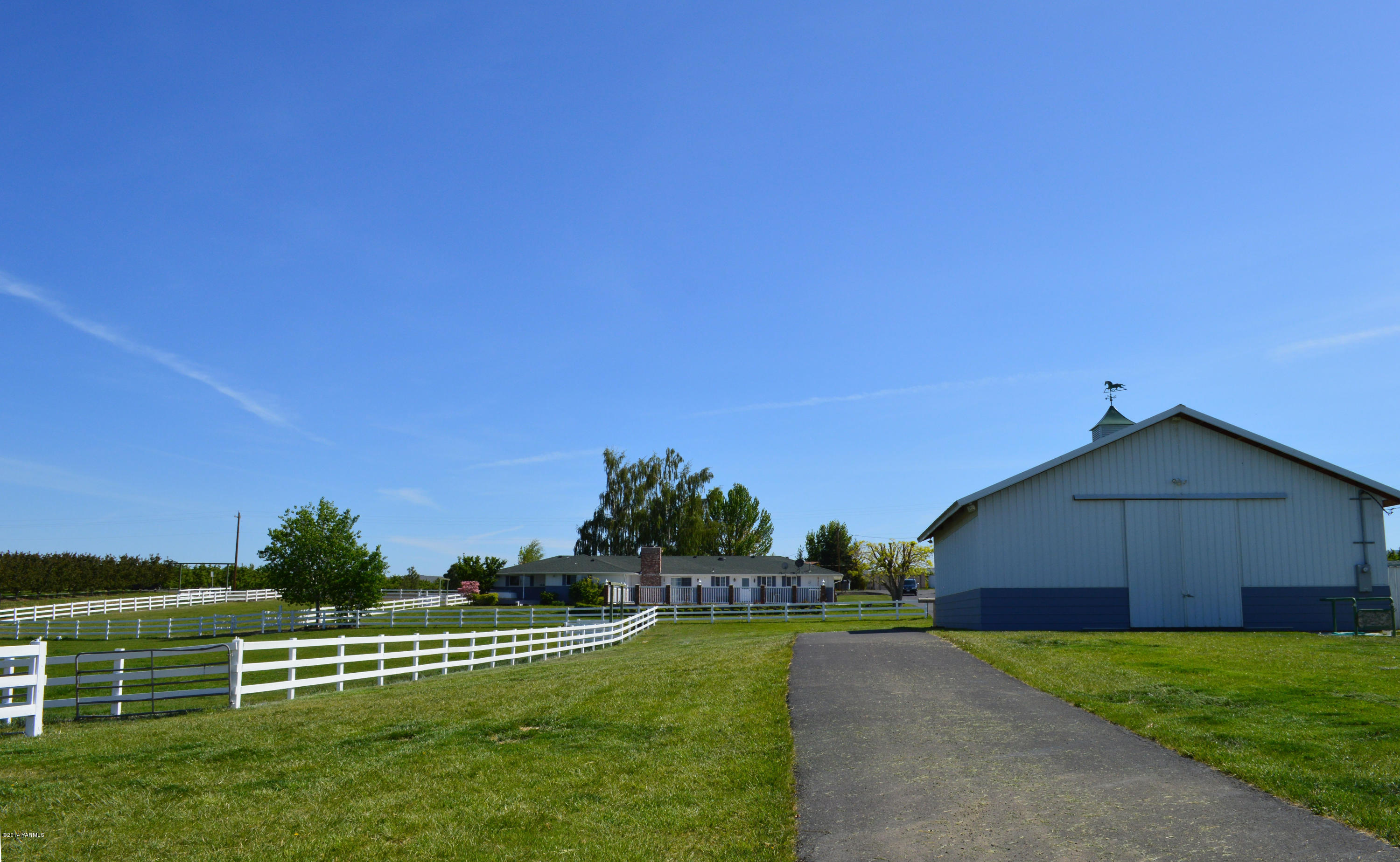 1051 Hubbard Road Yakima, WA 98903 - Photo 50 of 50 a view of a house with a yard and a garden