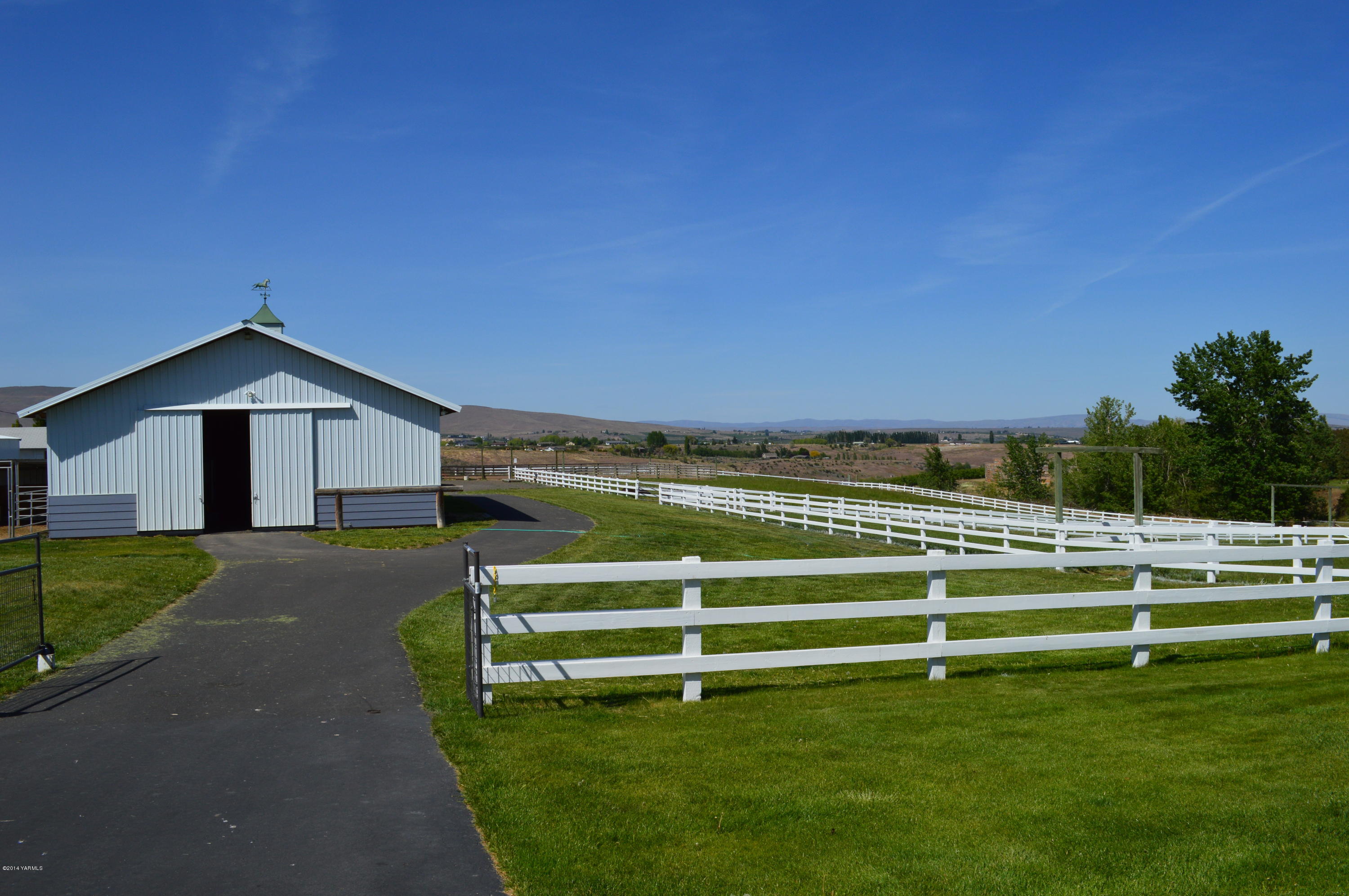 1051 Hubbard Road Yakima, WA 98903 - Photo 6 of 50 a view of a house with a yard