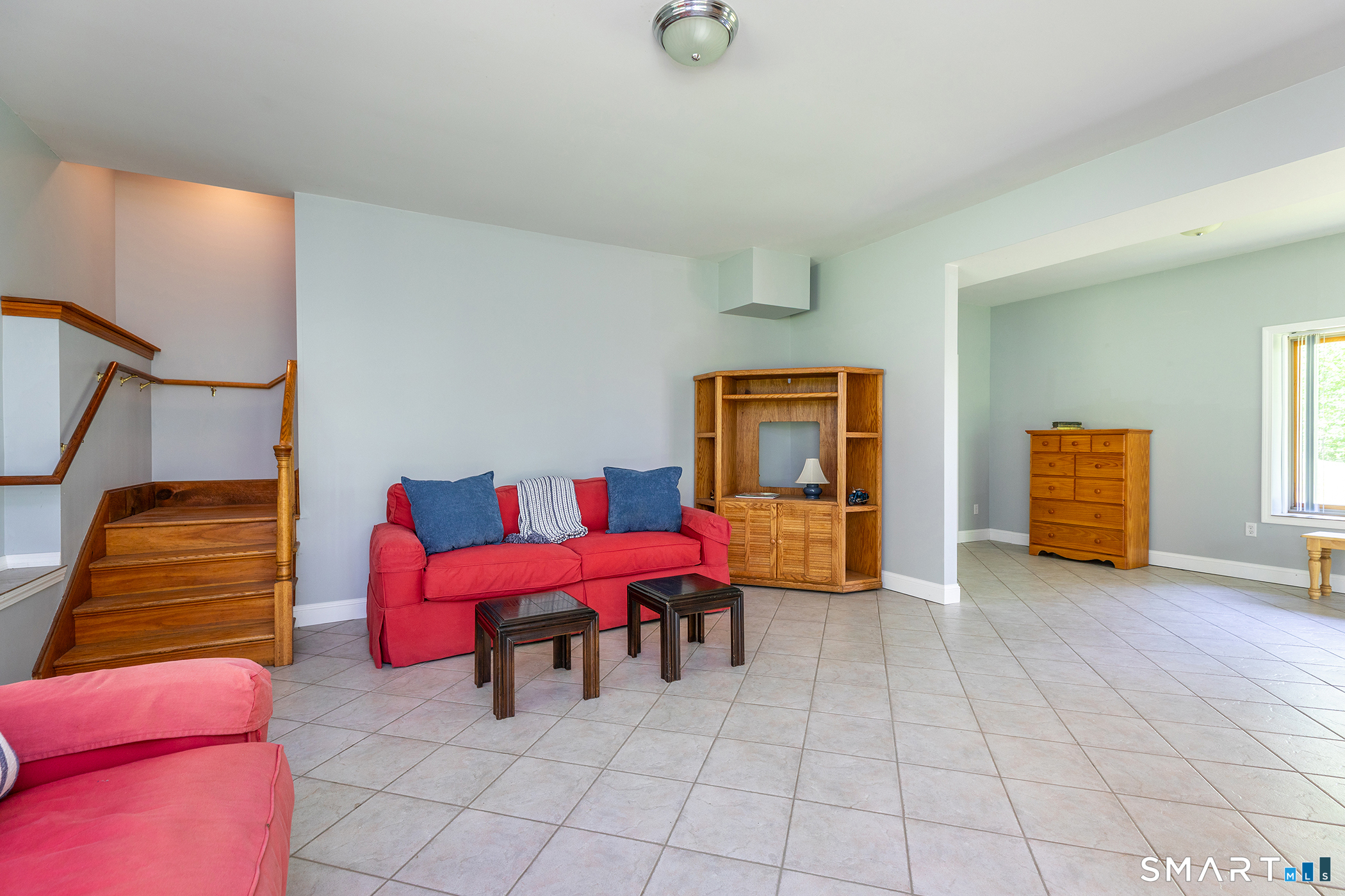 3 Old Forest Road Sherman, CT 06784 - Photo 27 of 38 a bedroom with furniture and a couch
