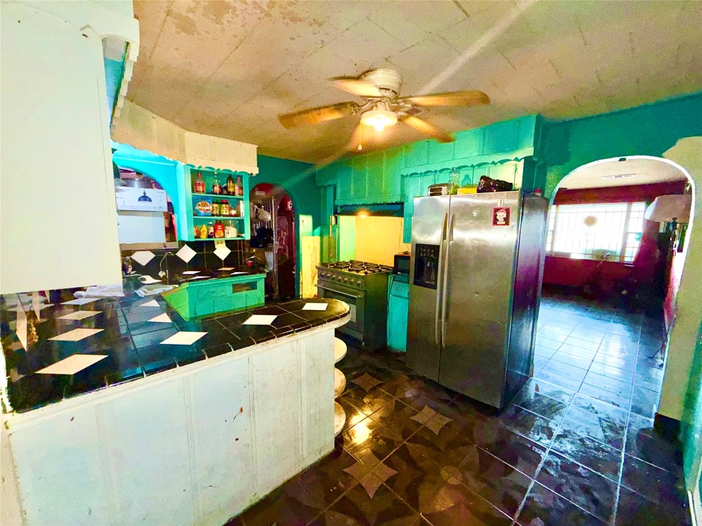 315 Gober Street Houston, TX 77017 - Photo 5 of 12 a kitchen view of a fireplace