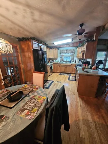 a kitchen with stainless steel appliances a stove and a sink